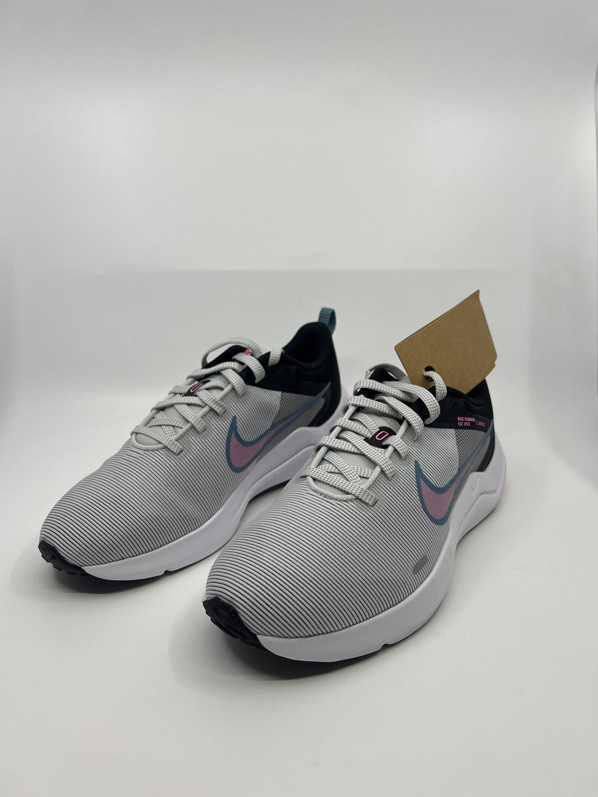 Nike women's Downshifter 12 Running 7.5 Photon Dust Pink Magic Smoke Grey